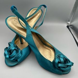 Women’s Kate Spade turquoise open toe high heeled shoes. Size 8.5. AC039